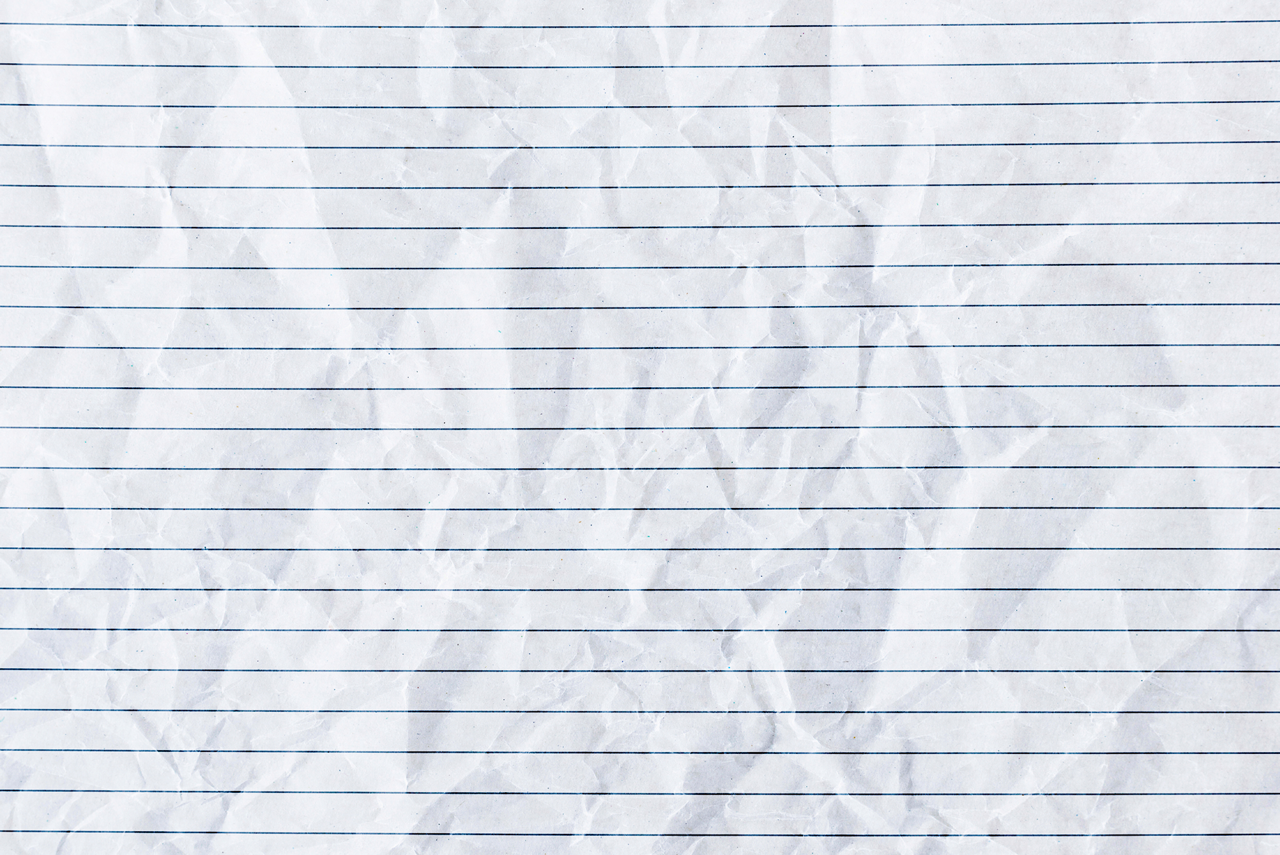 Piece of lined paper, with blue lines 